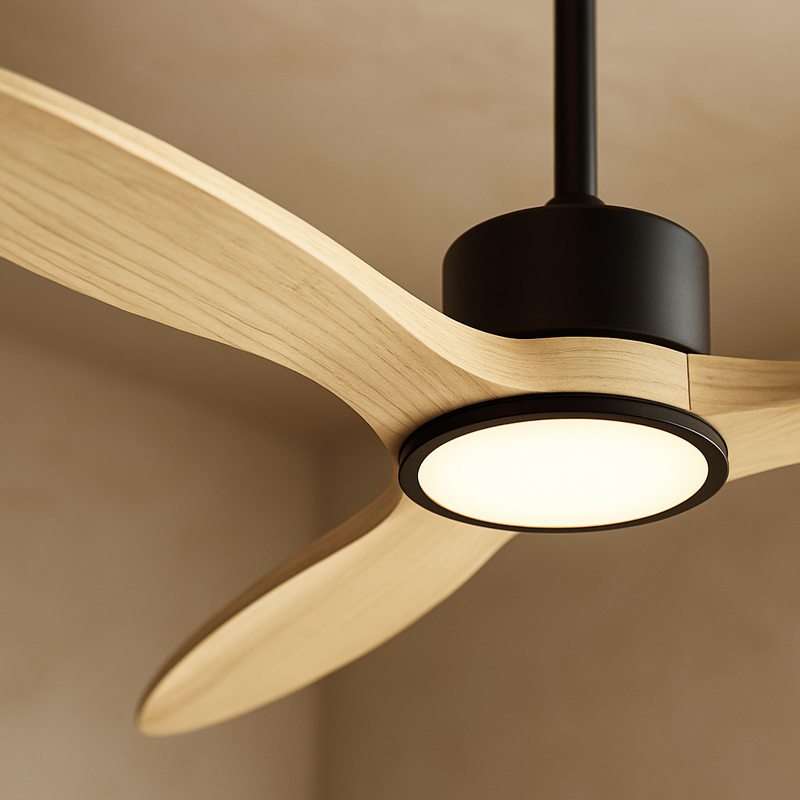 Ceiling fan with wooden blades and black light fixture on a beige background